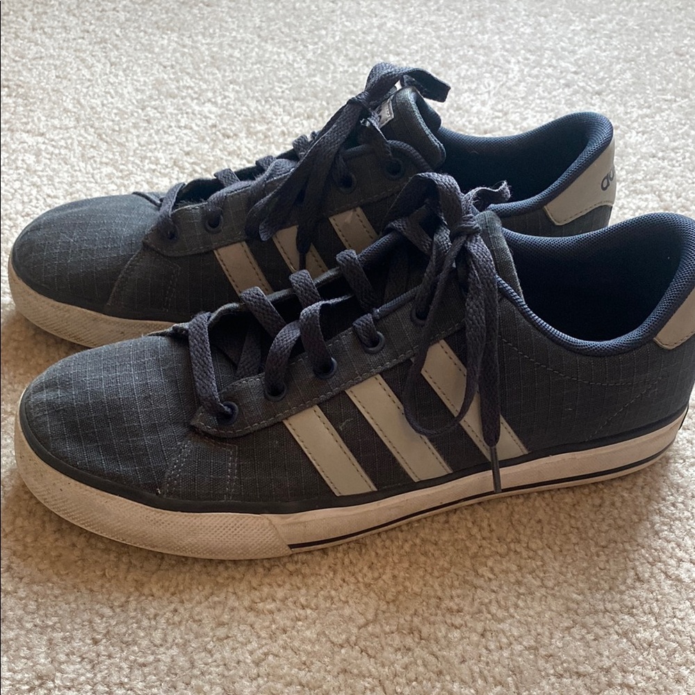 Adidas Black and White Sneakers with Iconic Three Stripes